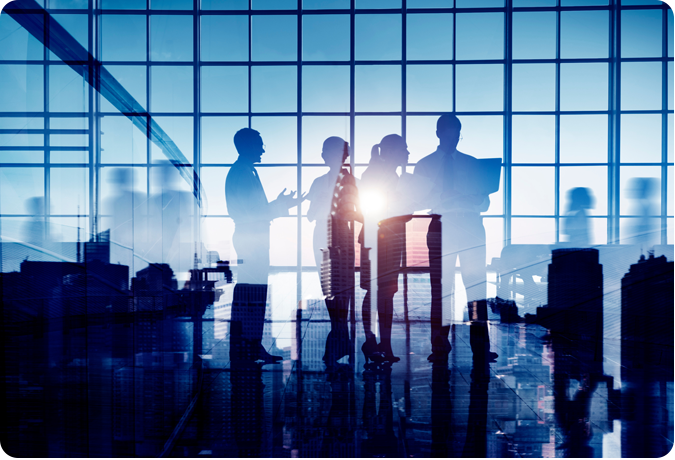 group of business people talking in an office